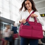 Quilted handbag with strap and handles