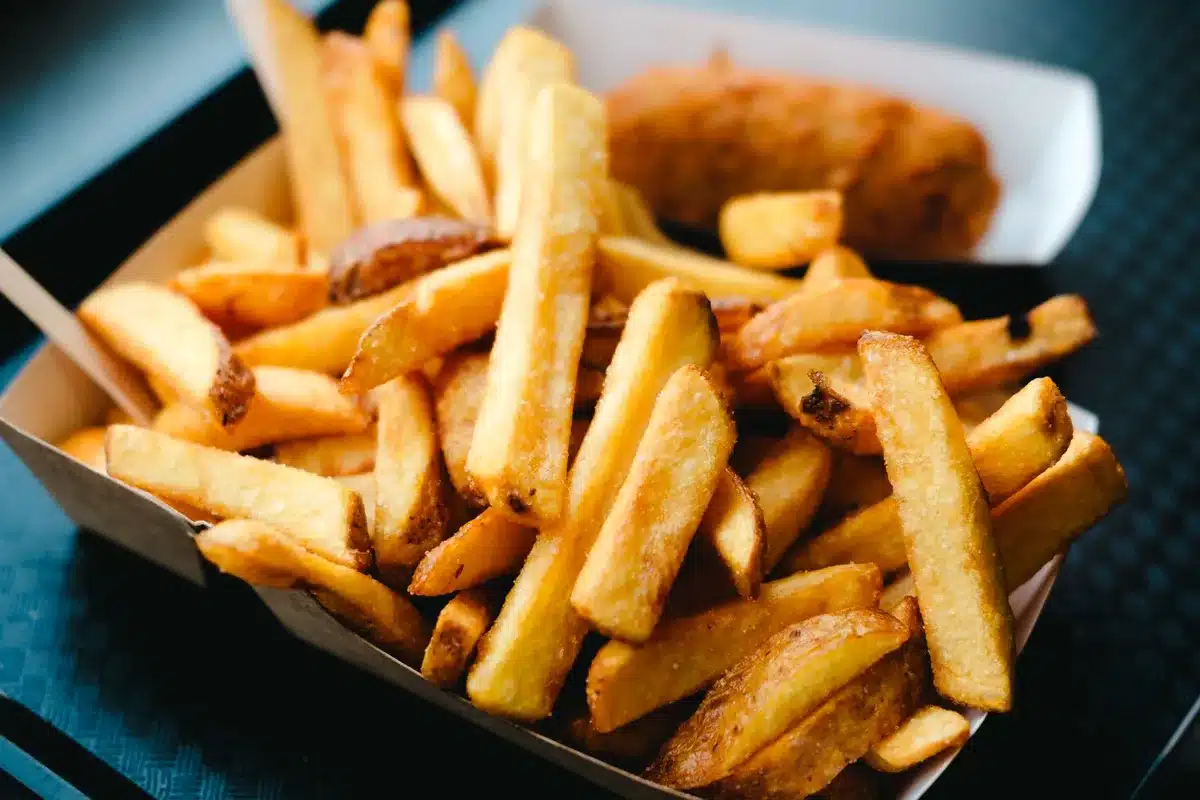 Plate of deep-fried takeaway food and chips
