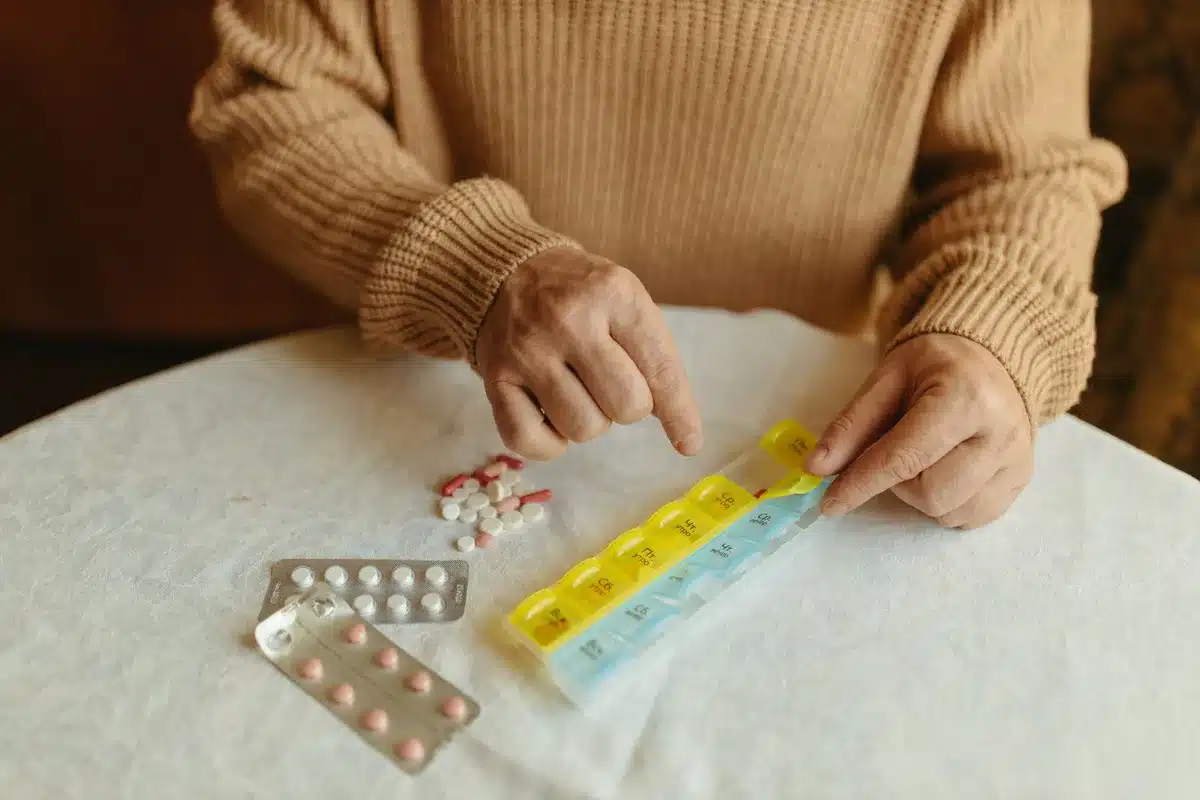 A calendar with marked medication days, illustrating adherence tracking and simplified dosing schedules
