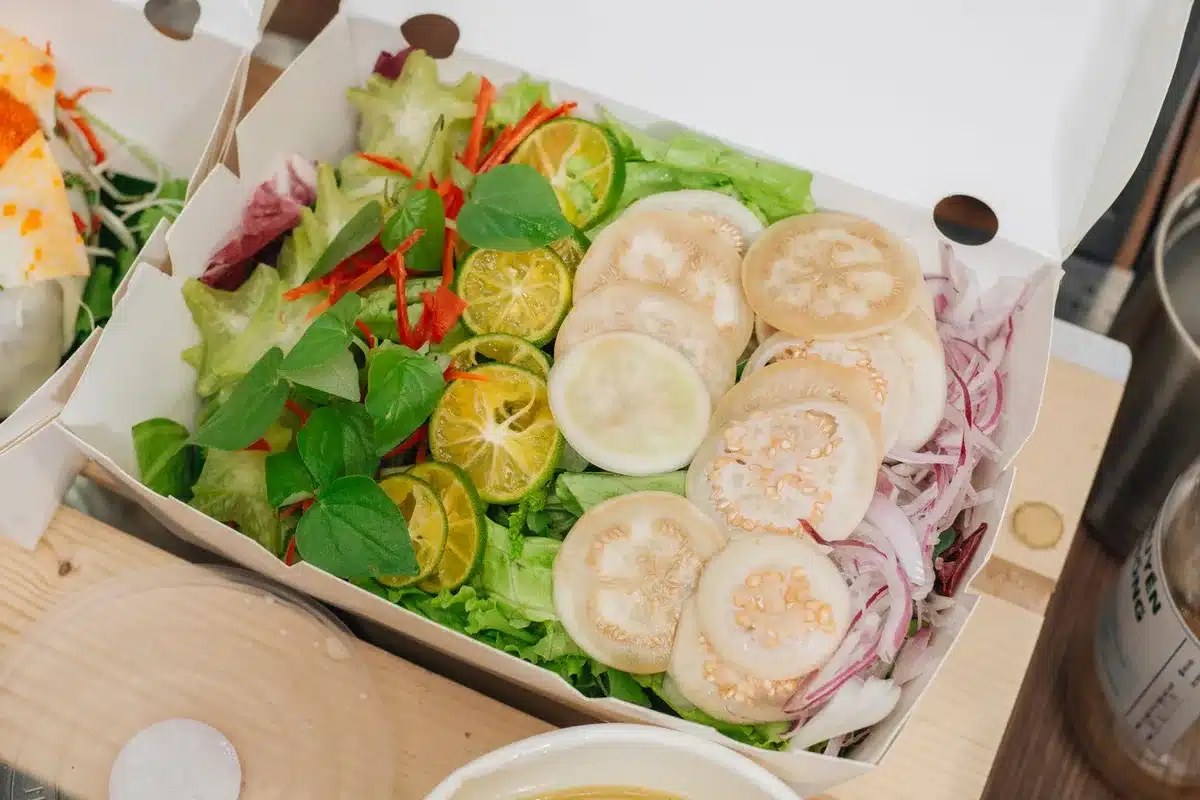 Taste the Difference British Salad Selection Box with peppers, cucumber and tomatoes displayed