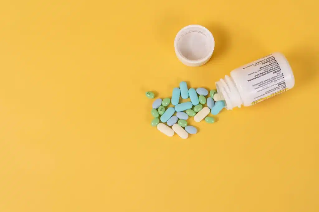 Prescription bottle with warning label and recall notice