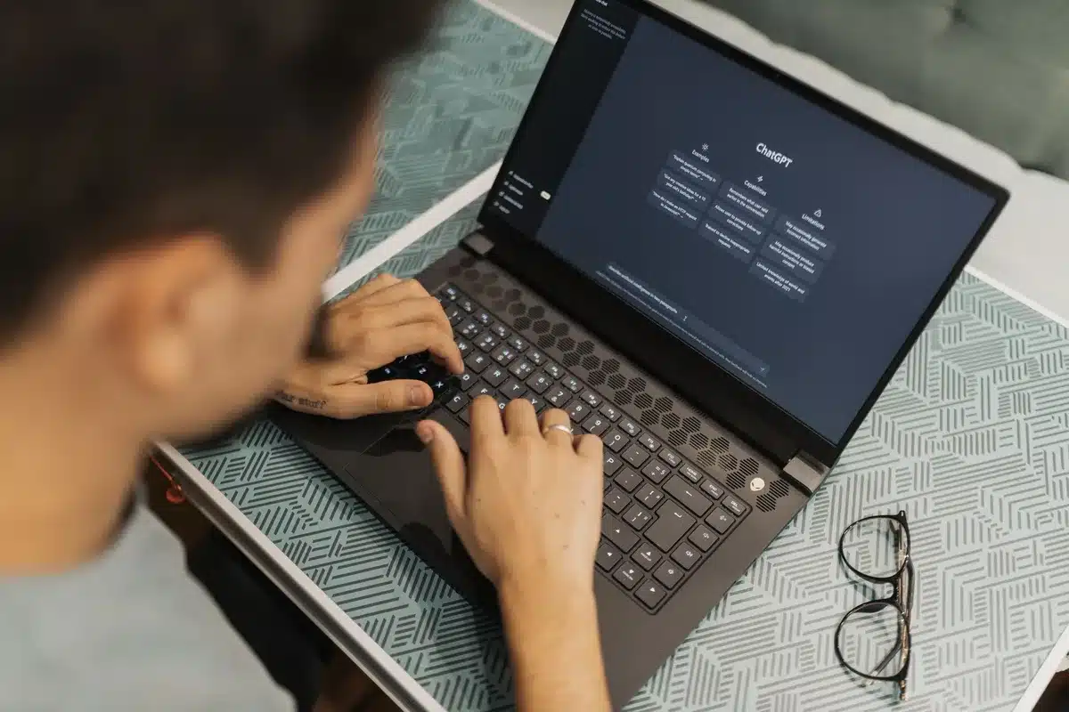 Patient using a laptop to research symptoms online with AI chat tools