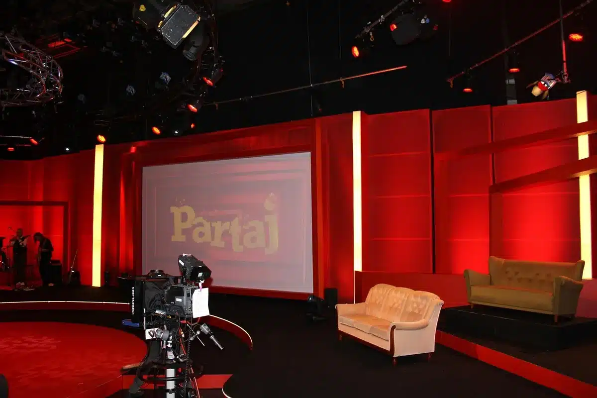 A modern television studio kitchen set ready for filming a cooking competition show