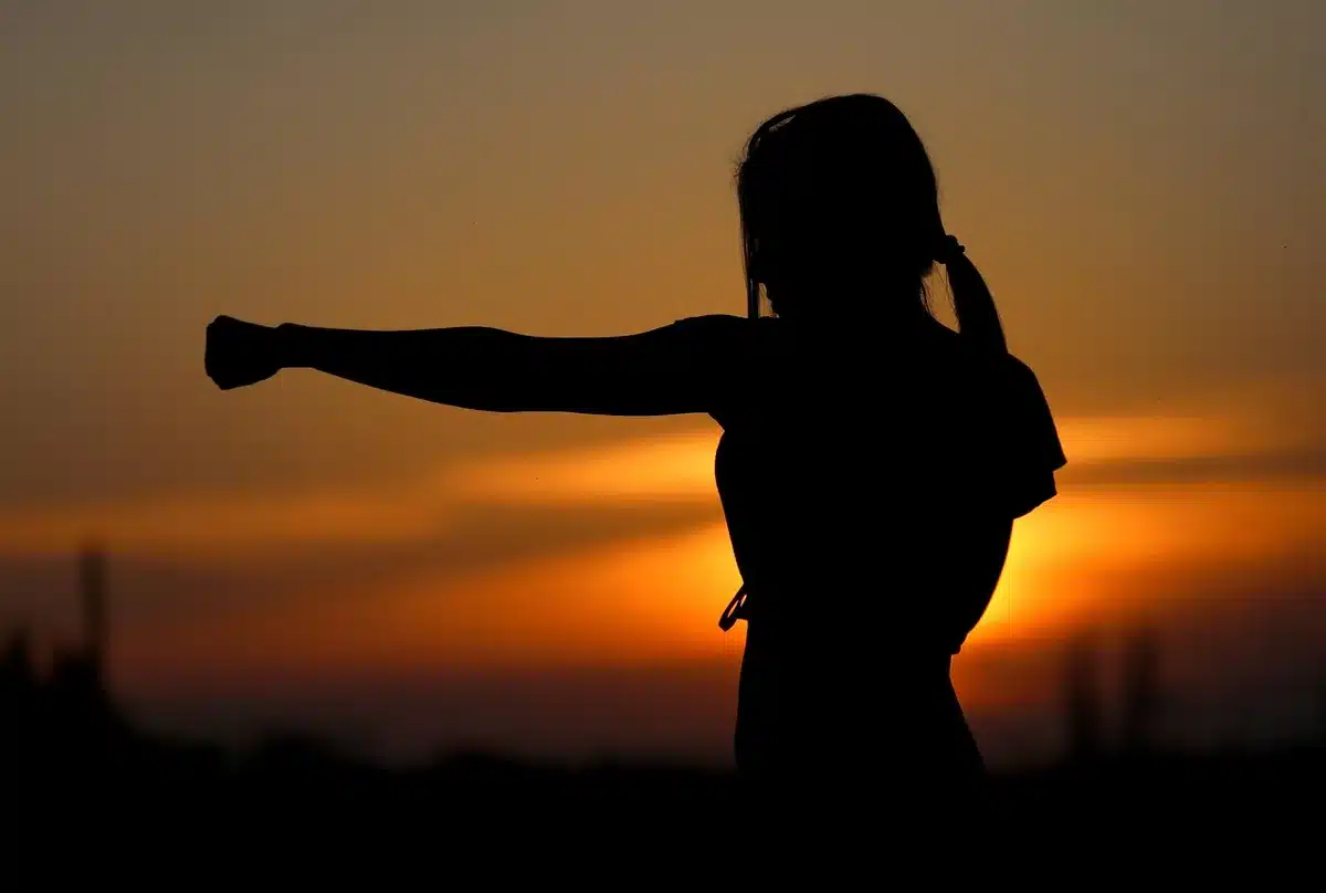 Older adult doing resistance band exercises at home