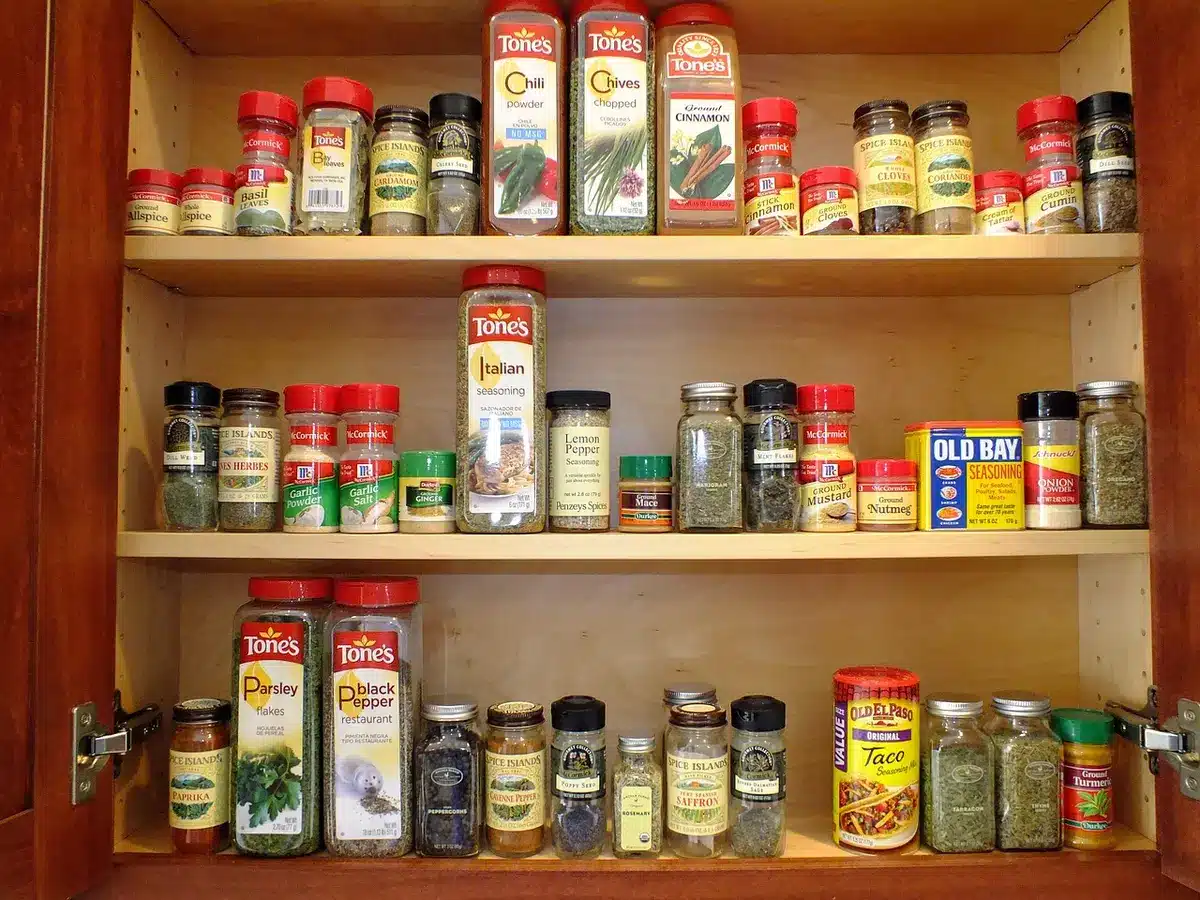 DIY pantry shelving with labeled containers and organized food storage bins