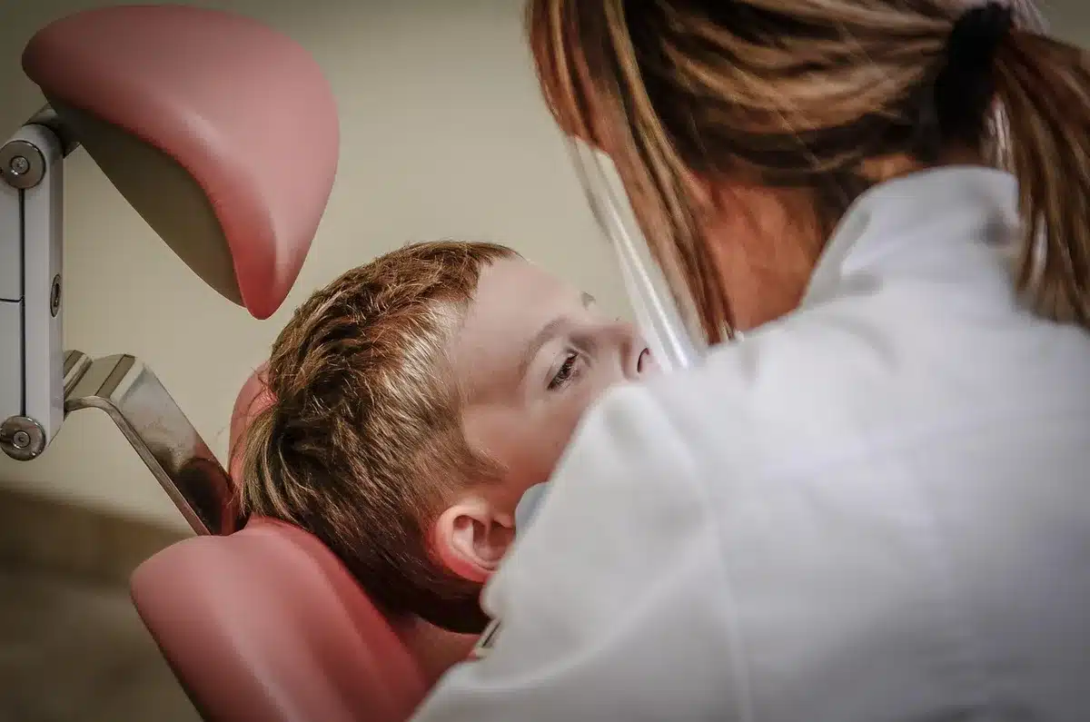 Woman completing a brief cognitive test with a clinician in daylight