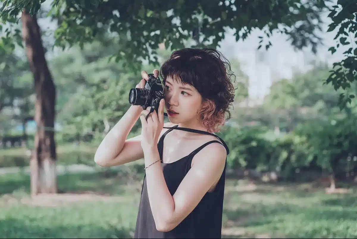 Photographer shooting a model to capture angles and tailoring