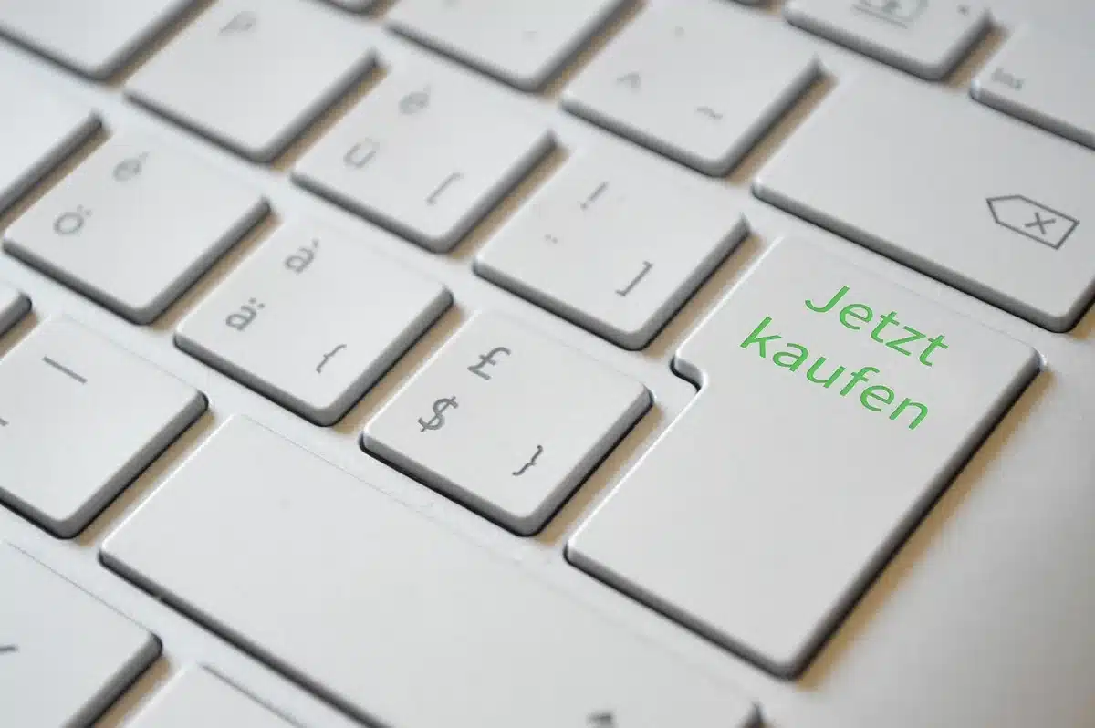 Person using laptop to book a Christmas food order on a retailer website