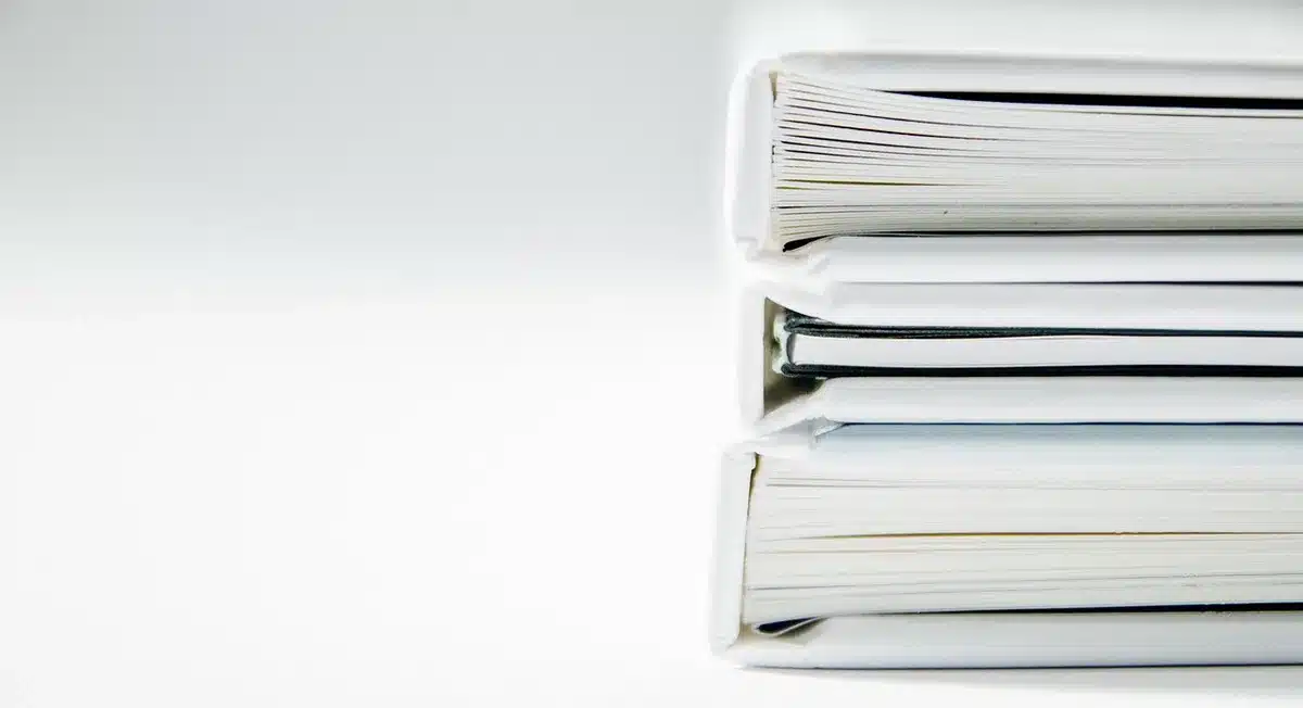 Clinician reviewing sleep study reports and charts
